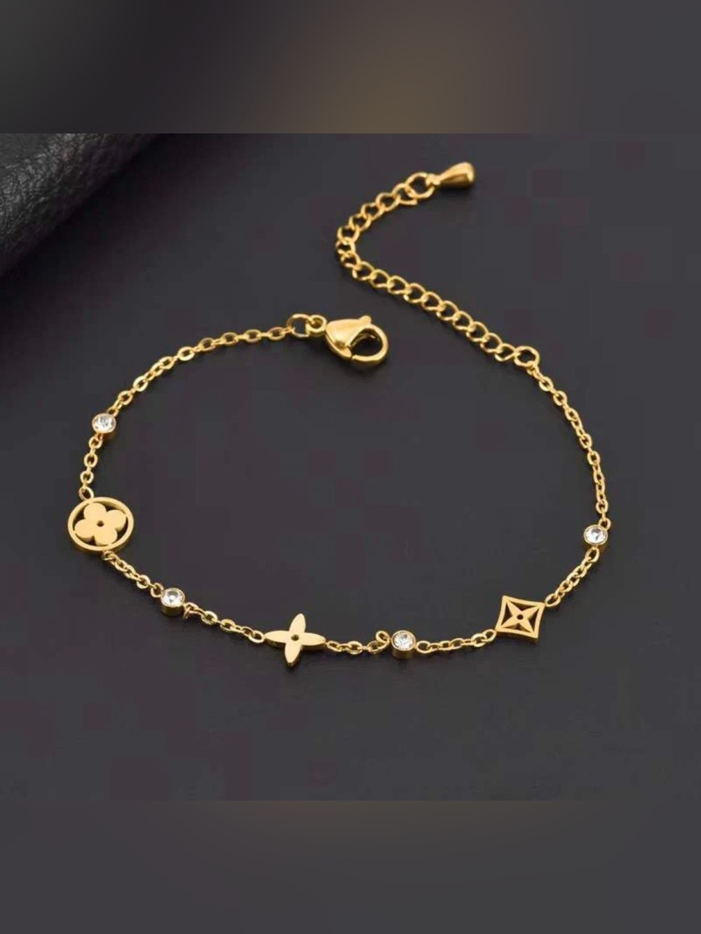 gold tone clover bracelet